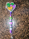 Mardi gras hearts badge reel