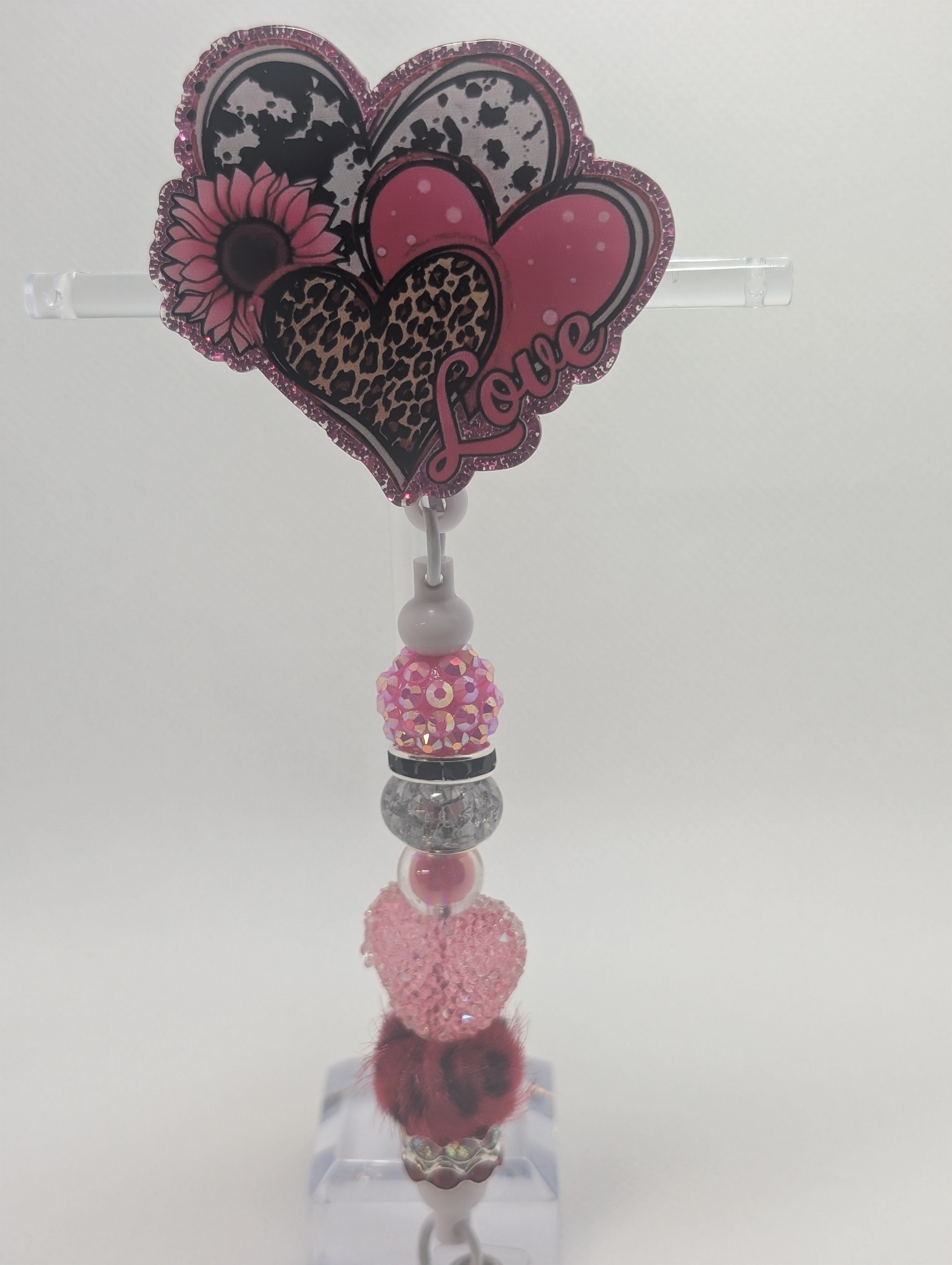 Triple heart badge reel